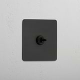Central Bronze Single Toggle Switch - Stylish Light Control Solution