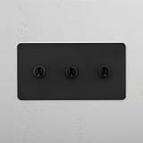 High-Performance Double Toggle Switch in Bronze with 3 Levers on White Background