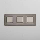 High Capacity Light Control Switch: Polished Nickel Black Triple 3x Rocker Switch on White Background
