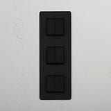 High-Capacity Bronze Black Triple Vertical Rocker Switch - Advanced Light Control Accessory on White Background