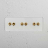 Six-Levers Triple Toggle Switch in Clear Antique Brass - Elegant Light Control Solution on White Background