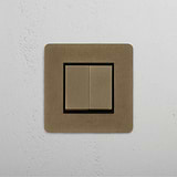 Double Rocker Switch in Antique Brass Black, Single Set on White Background