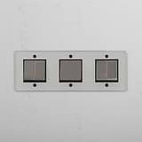 Diverse Six-Position Triple Rocker Switch in Clear Polished Nickel Black - Multifunctional Lighting Solution on White Background