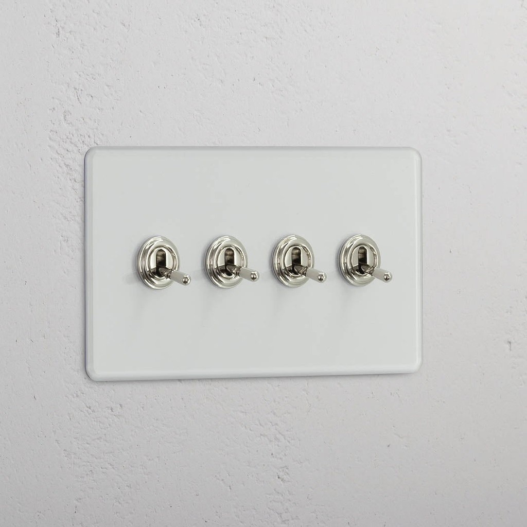 Interruptor articulado duplo de quatro botões em Níquel Polido Transparente - Solução de controlo de luz avançada