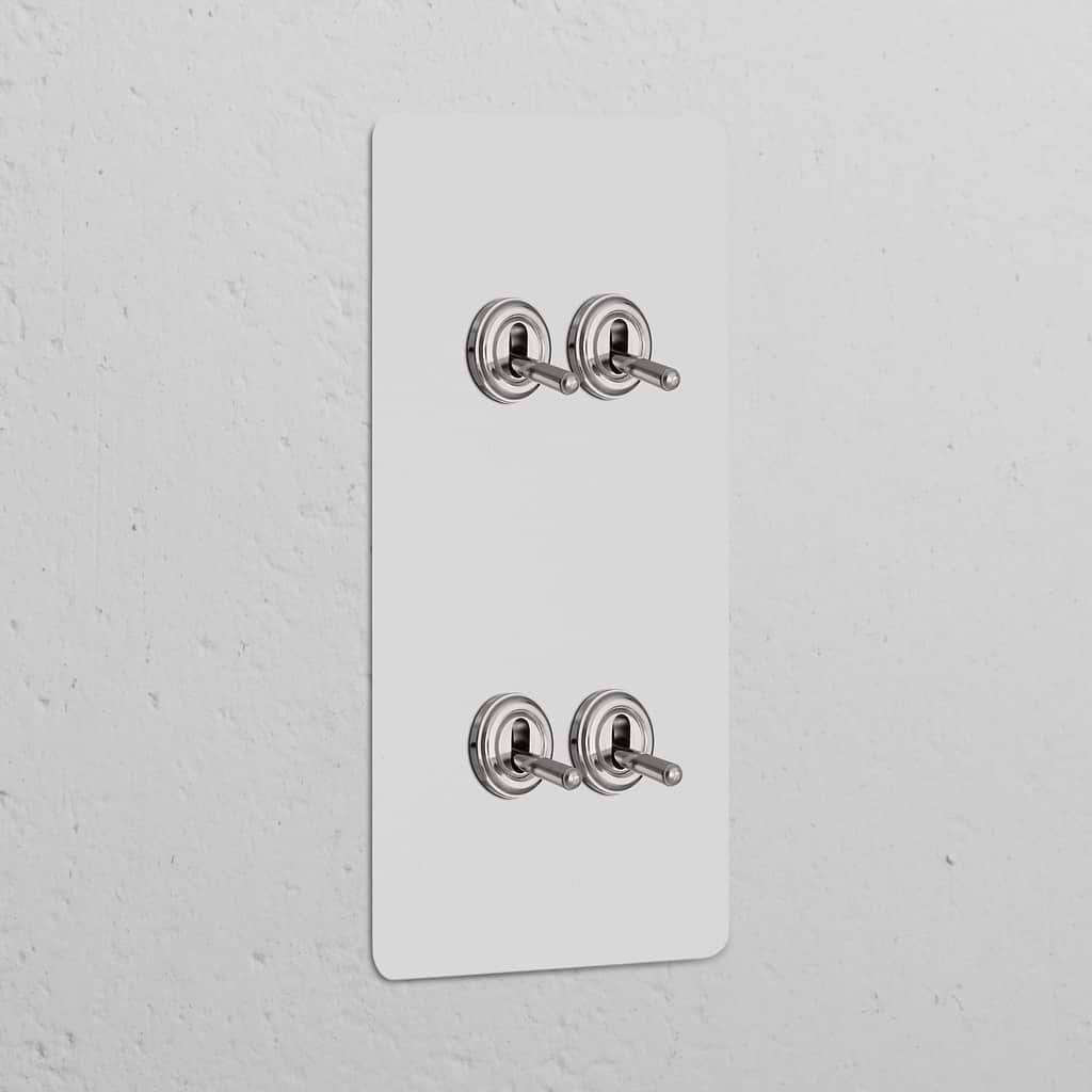 Interruptor articulado vertical de quatro vias duplo – Níquel Polido Pintável 