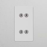 Interruptor articulado vertical de quatro vias duplo – Níquel Polido Pintável 