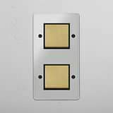 Interruptor basculante duplo vertical Latão Antigo Preto Transparente - Acessório de gestão de luz eficiente em fundo branco