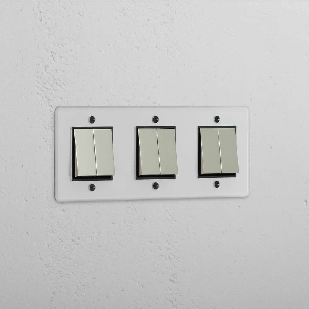 Interruptor basculante triplo de seis posições em Níquel Polido Transparente Preto - Solução de iluminação diversa