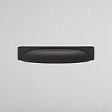 Puxador em concha Elm Bronze em fundo branco