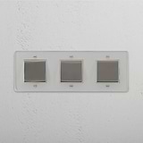 Interruptor basculante triplo multifunções em Níquel Polido Transparente Branco - Solução de controlo de luz abrangente em fundo branco