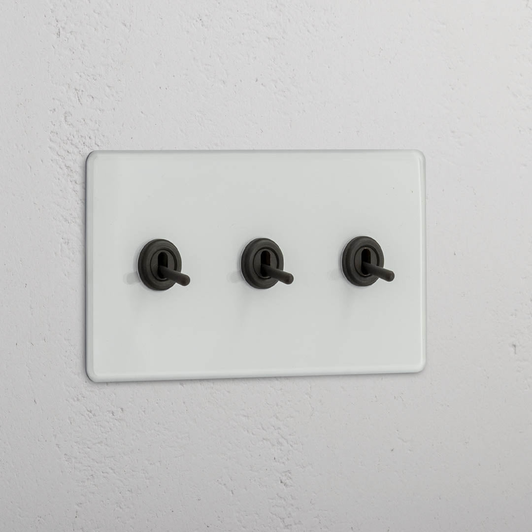 Interruptor articulado triplo em Bronze Transparente - Acessório de gestão de luz abrangente