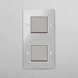 Eficiente interruptor basculante duplo vertical em Níquel Polido Transparente Branco - Solução de iluminação avançada em fundo branco