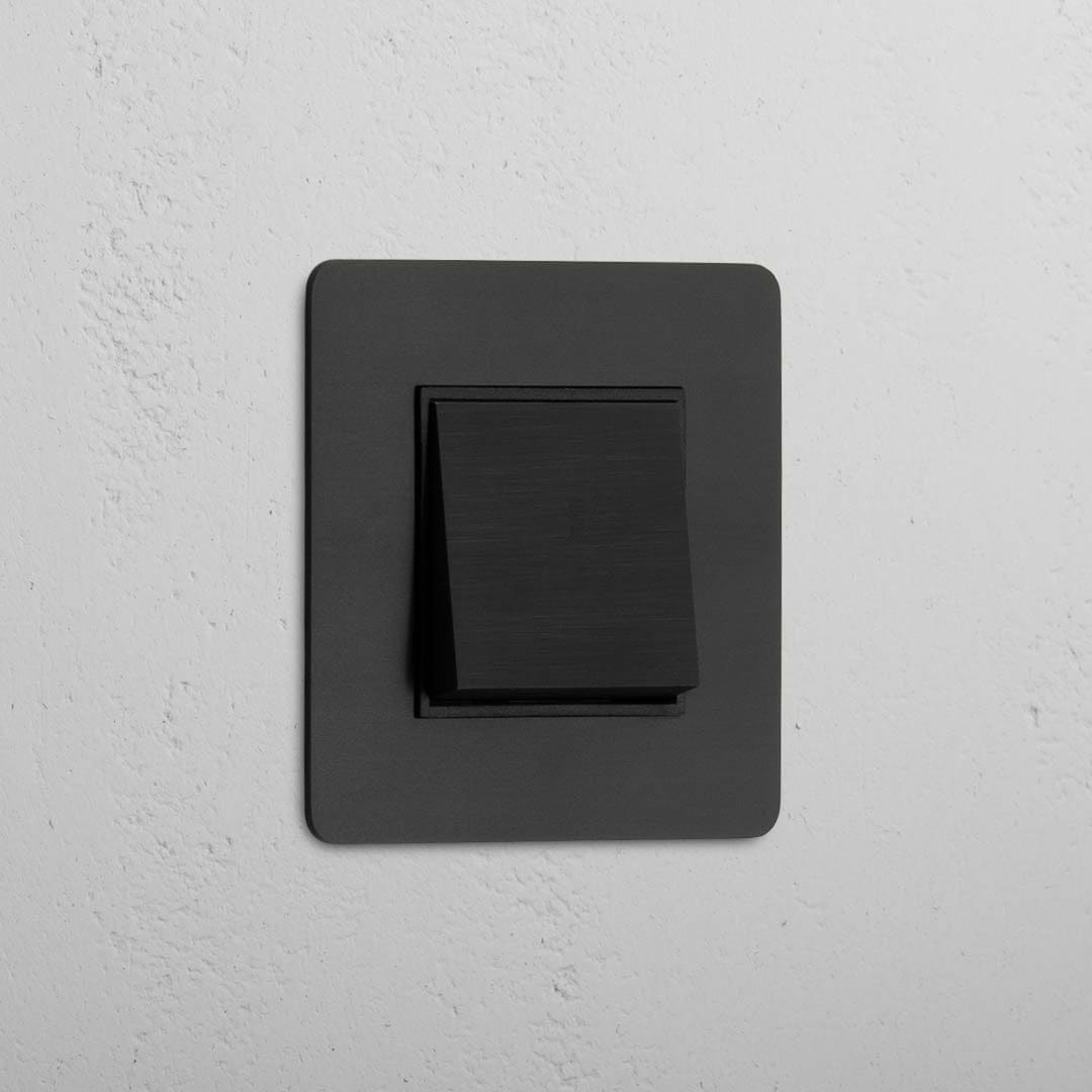 Operação suave com interruptor basculante individual em Bronze Preto - Design contemporâneo
