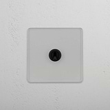 Conveniente interruptor articulado individual retrátil em Bronze Transparente para gestão de luz em fundo branco