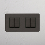 Elegante interruptor basculante duplo em Bronze Preto com 4 posições em fundo branco