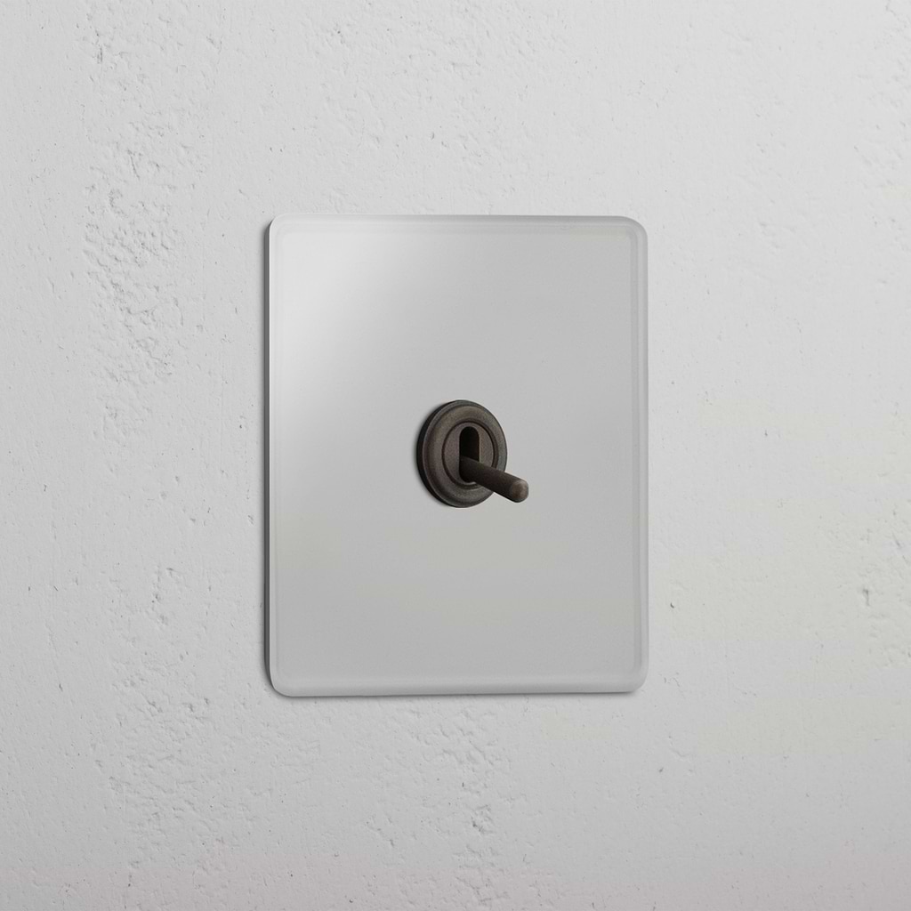 Interruptor articulado individual inversor em Bronze Transparente - Ferramenta de controlo de iluminação flexível
