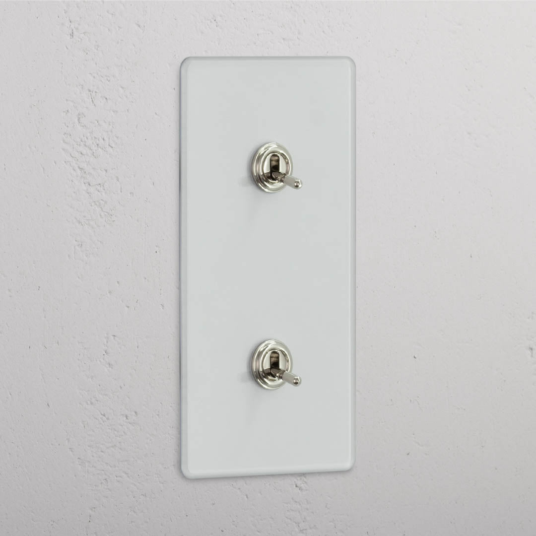 Versátil interruptor articulado duplo vertical em Níquel Polido Transparente - Acessório de gestão de luz conveniente