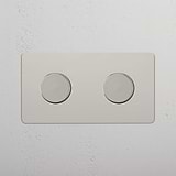 Interruptor de controlo de luz duplo ajustável: Interruptor regulador duplo em Níquel Polido em fundo branco
