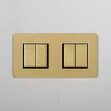 Interruptor basculante duplo Latão Antigo Preto, design de quatro botões em fundo branco