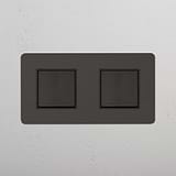 Contemporâneo interruptor basculante de duas posições em Bronze Preto para casas modernas em fundo branco