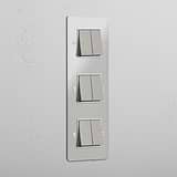 Interruptor basculante triplo de seis funções vertical em Níquel Polido Transparente Branco - Solução de iluminação avançada