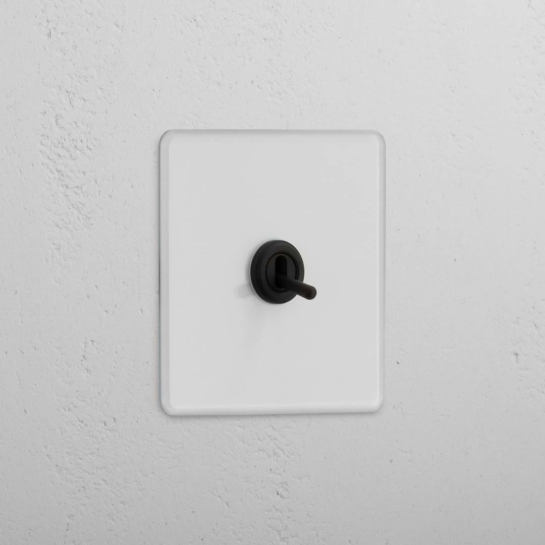 Interruptor articulado individual em Bronze Transparente - Solução de comutação de luz fiável