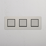 Interruptor de controlo de luz de alta capacidade: Interruptor basculante 3x triplo Níquel Polido Preto em fundo branco
