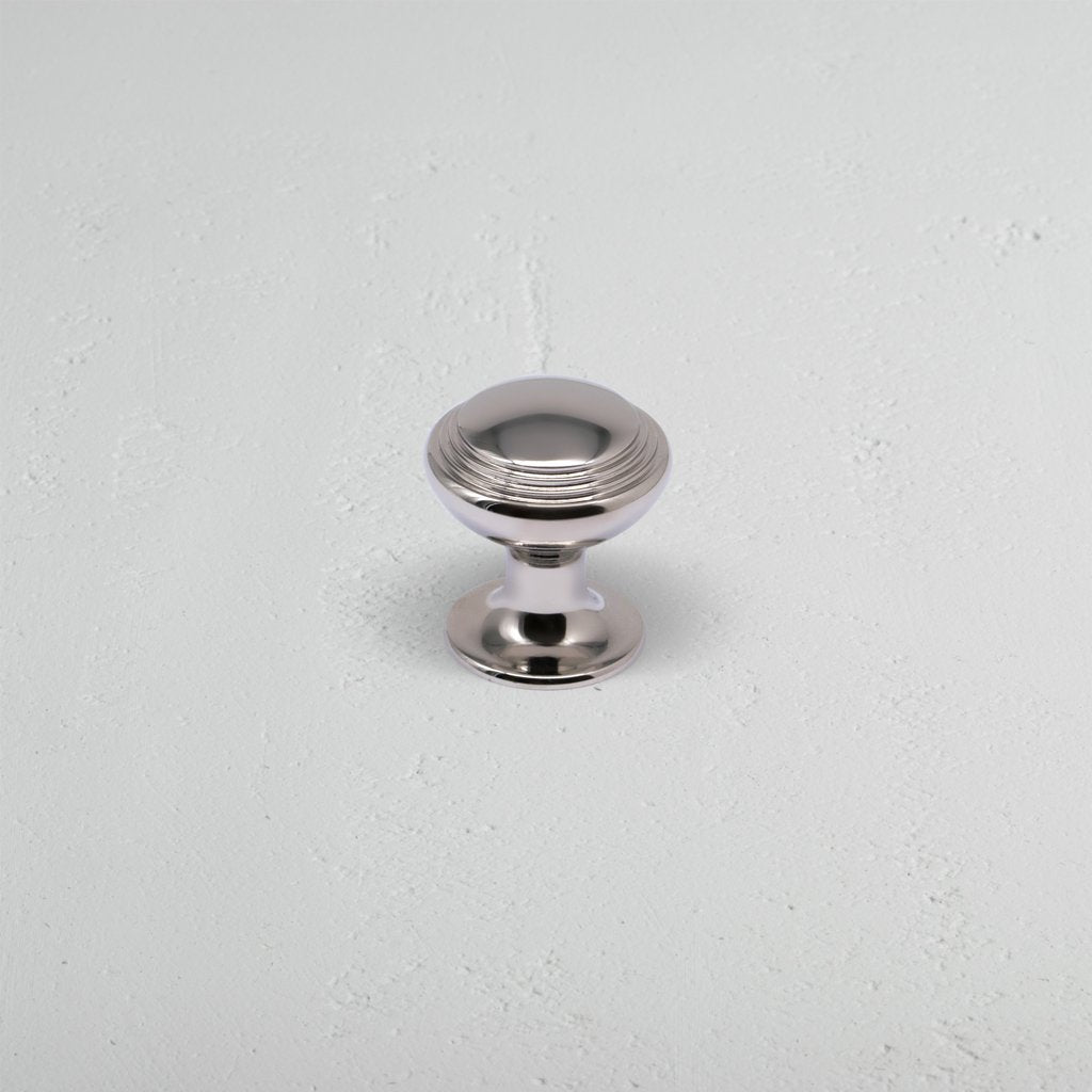 Polished Nickel Barlow Furniture Knob On White Background