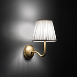 Medium Malvern Wall light in Alabaster White at an angle and turned on