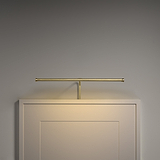 The Harrow 400mm Picture Light in Antique Brass is a minimal gold wall-mounted light fixture.