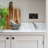 Bronze Designer Double Socket On Marble Kitchen Counter