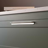 Polished Nickel Oxford Furniture Handle 224mm Recessed grip fitted to a dark grey furniture drawer. 