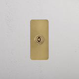 1G Architrave Centre Retractive Toggle Switch - Antique Brass