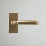 Digby Short Plate Sprung Door Handle - Antique Brass