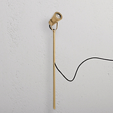 Cambridge Ground Spotlight 24V outdoor spotlight in antique brass, featuring an angled head and black cord.