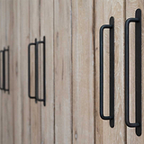 Bronze Kilburn Furniture Handles On Wooden Cupboards