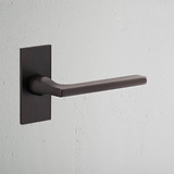 Clayton Short Plate Sprung Door Handle – Bronze  
