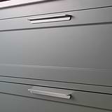 Polished Nickel Oxford Furniture Handle 384mm fitted to green under cabinet drawers. 