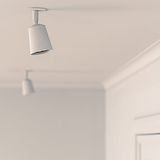 Paintable Pembroke Spotlight 50mm ceiling mounted painted white on a white ceiling. 