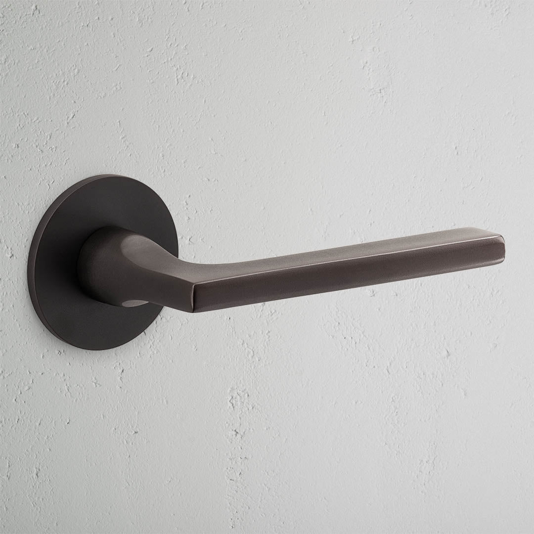 Clayton Flush Rose Unsprung Door Handle - Bronze   