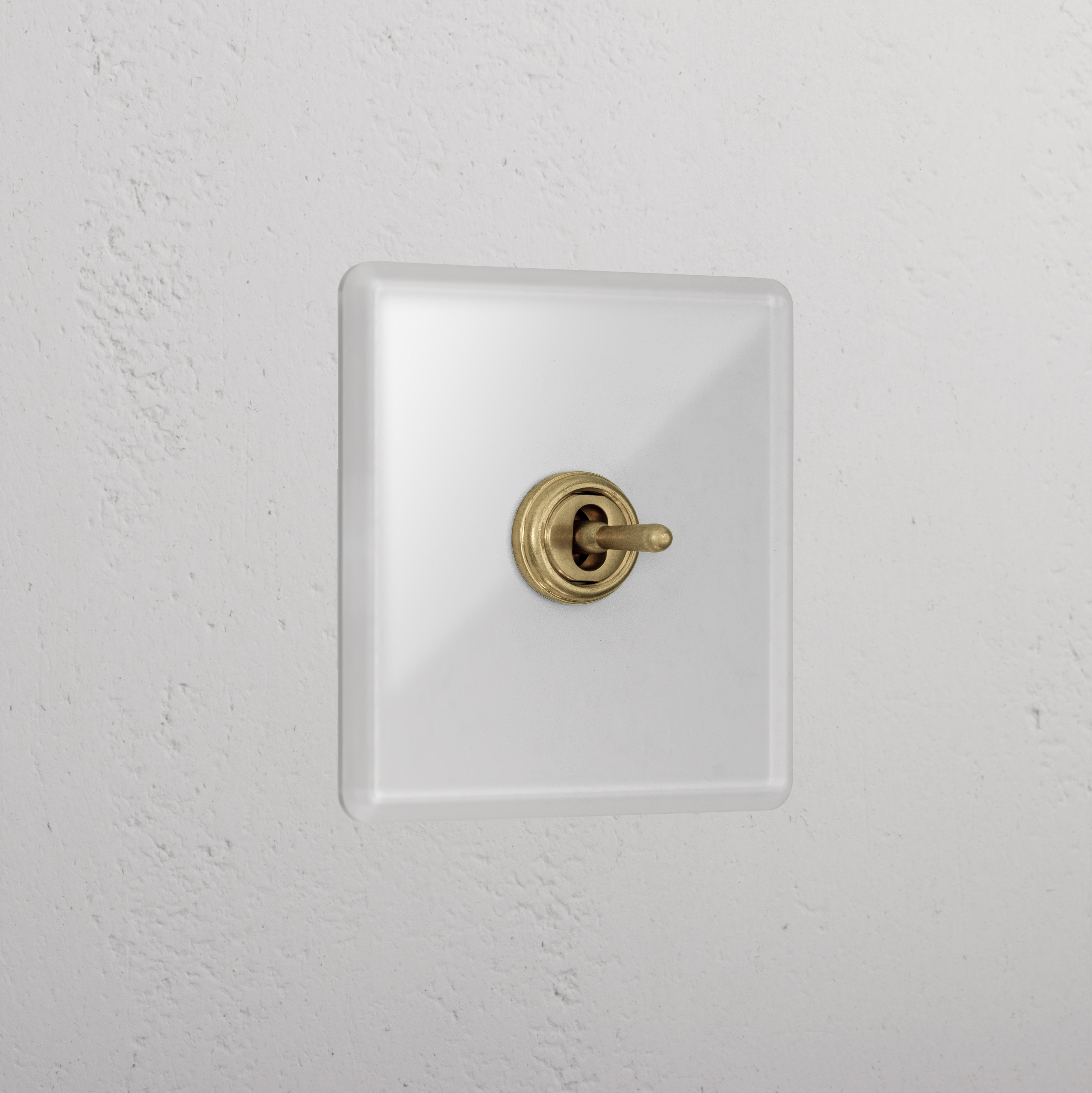 1G Centre Retractive Toggle Switch - Clear Antique Brass