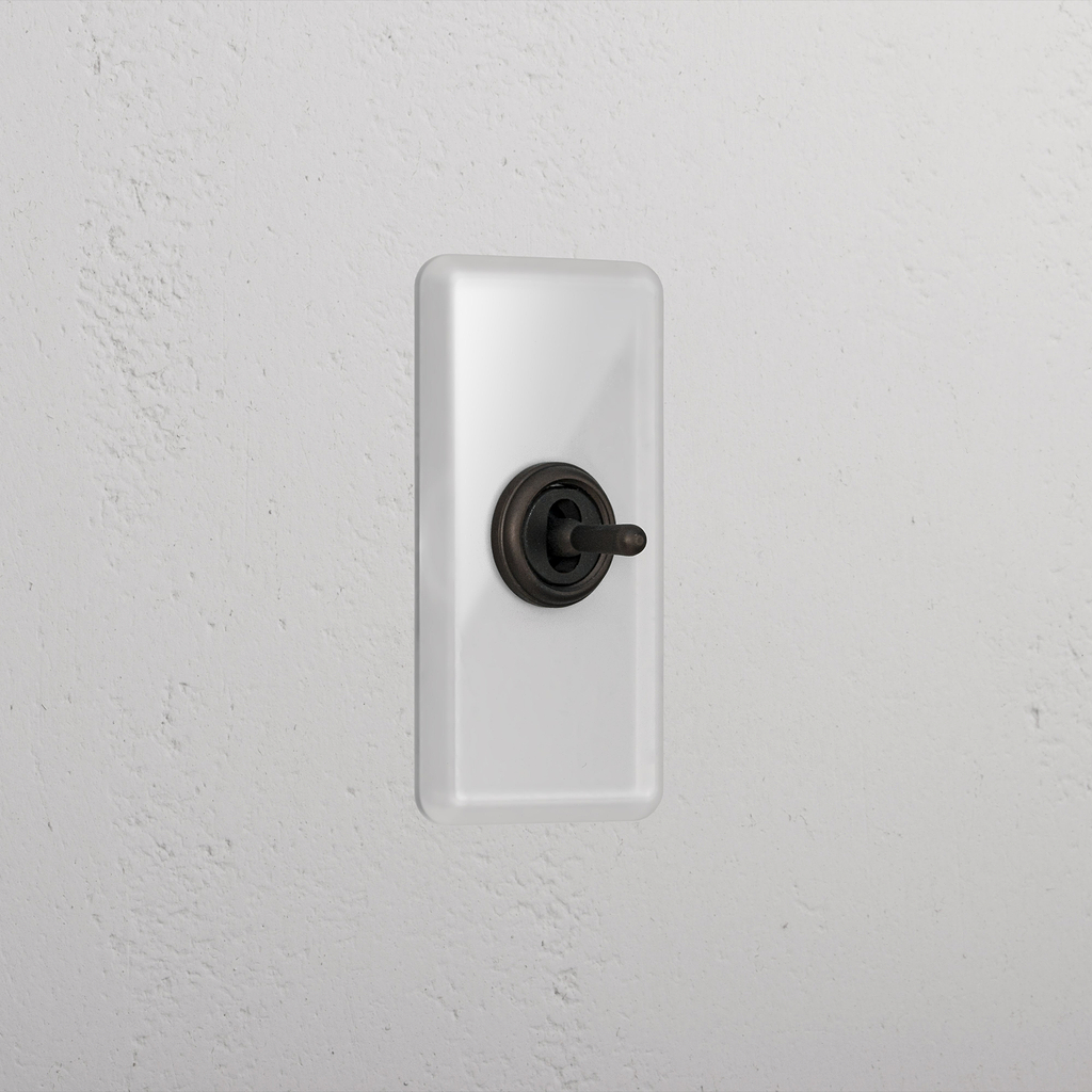 1G Architrave Centre Retractive Toggle Switch - Clear Bronze