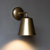 Antique Brass Richmond Medium Wall Light On Grey Background