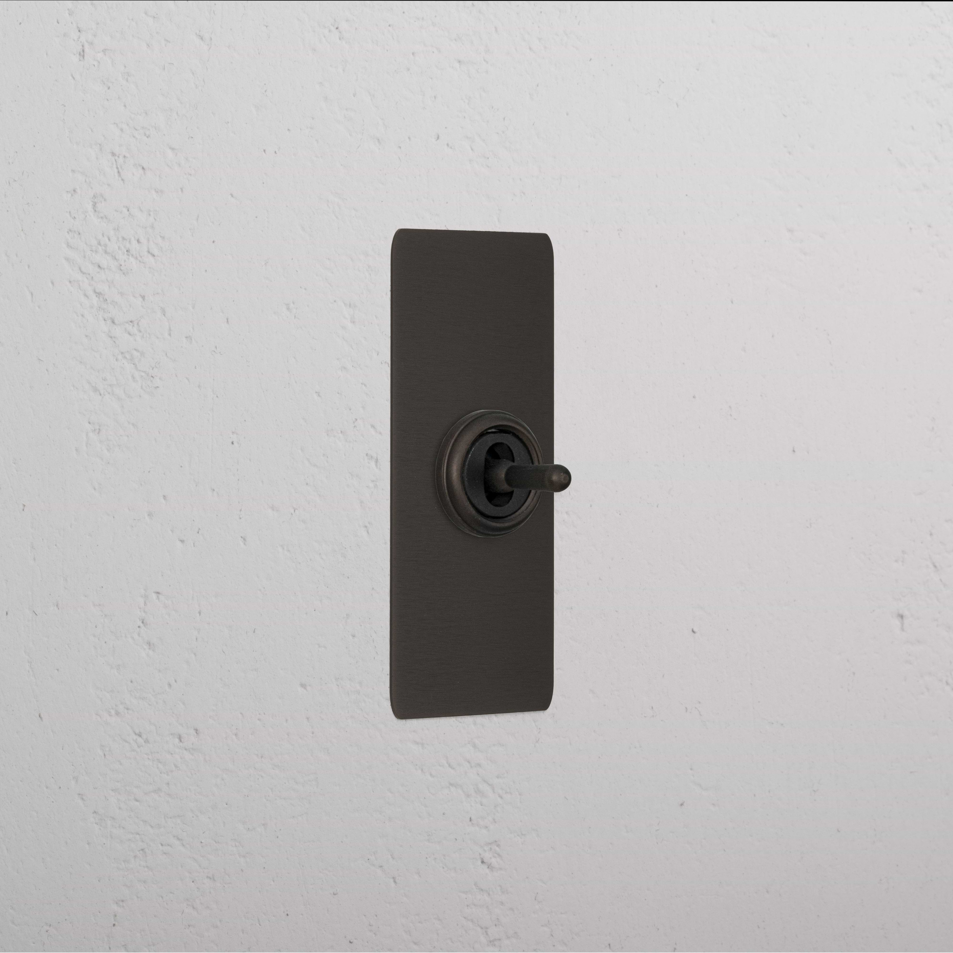 1G Architrave Centre Retractive Toggle Switch - Bronze