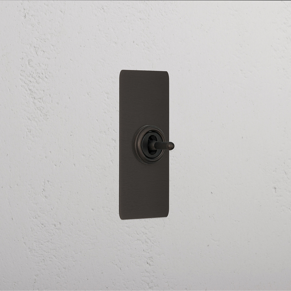 1G Architrave Centre Retractive Toggle Switch - Bronze