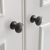 2x Bronze Barlow Furniture Knob On White Door