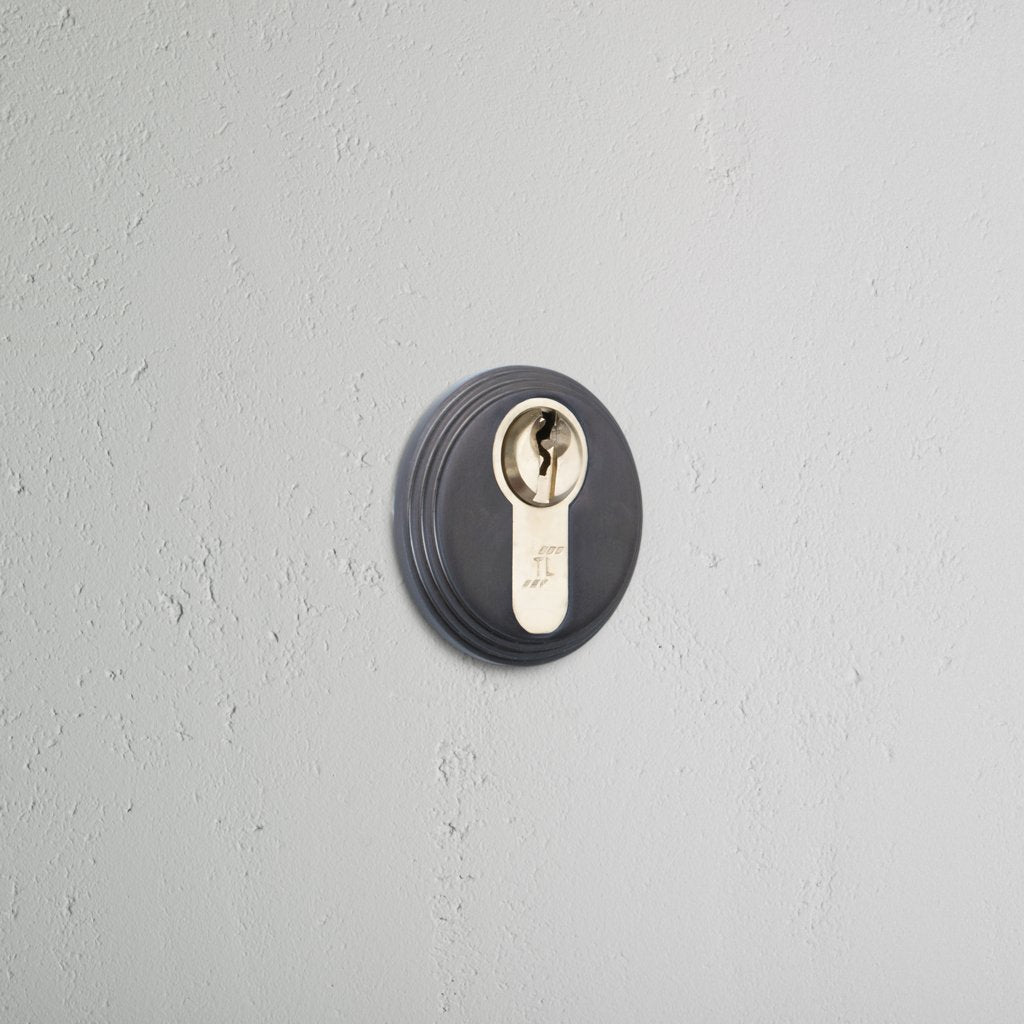 Bronze Warwick Key Escutcheon On White Background