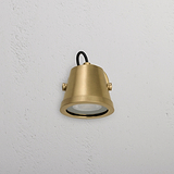 Cambridge Wall Floodlight in antique brass finish, mounted outdoors, designed for wall floodlighting.