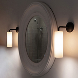 Bronze Wall Light Turned On With Fine Porcelain Shade And Mirrorside