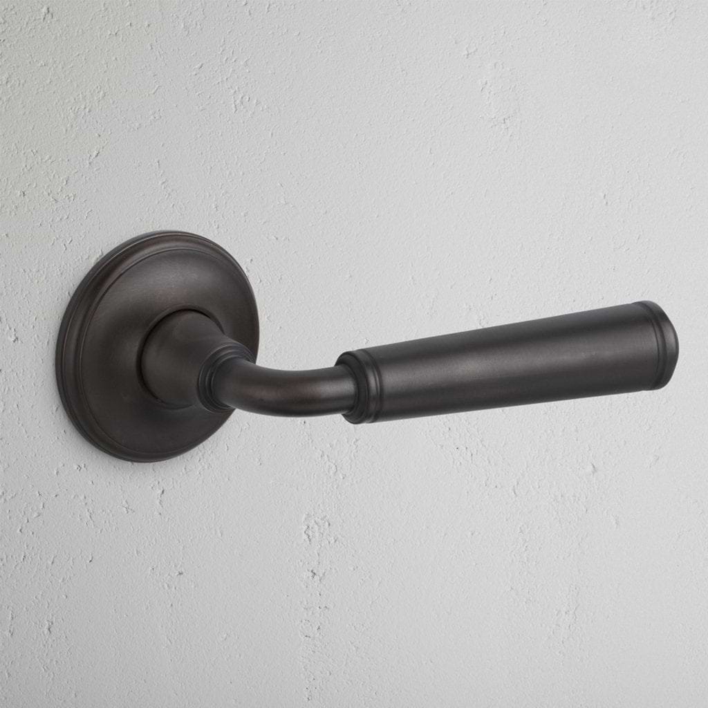 Bronze Digby Fixed Door Handle On White Background